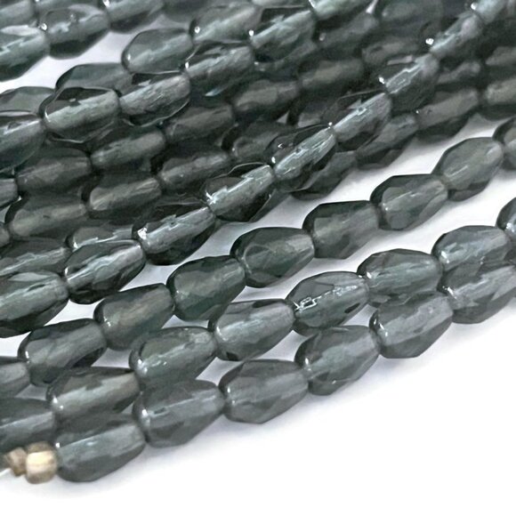 As Low as $2 6.5mm x 4.5mm Smokey Grey Faceted Pressed Drop Czech Beads (15) - Picture 2 of 3